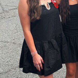 Black with white trim romper